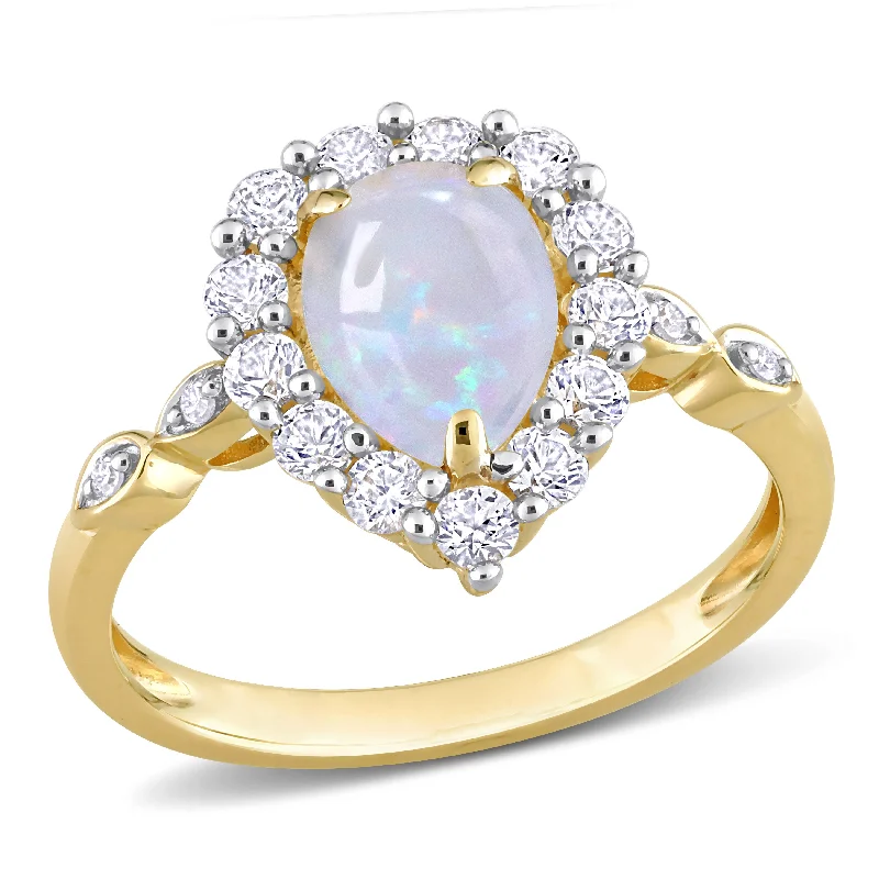 inscribed tradition ring-1 1/2 CT TGW Pear Shape Opal and Created White Sapphire and Diamond Accent Halo Ring in 10K Yellow Gold