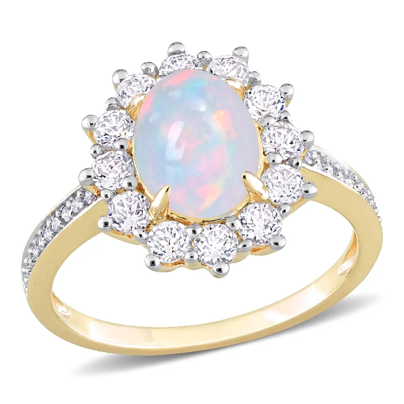 vintage-style emerald ring-2 1/6 CT TGW Oval Shape Blue Ethiopian Opal and White Topaz and 1/10 CT TW Diamond  Halo Ring in Yellow Plated Sterling Silver