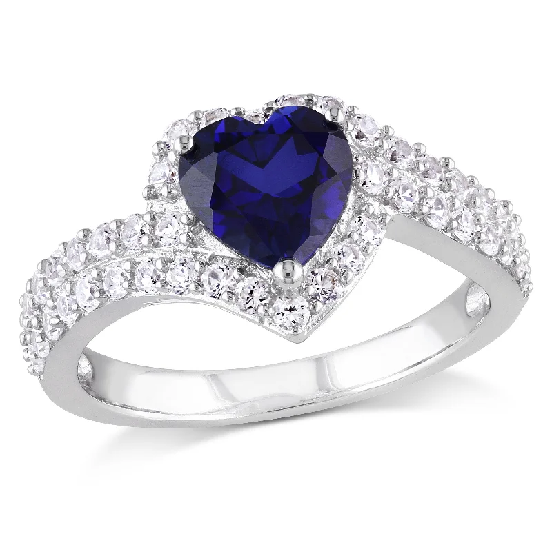 bold emerald summit peak ring-2 3/4 CT TGW Created Blue and Created White Sapphire Heart Halo Double Row Ring in Sterling Silver