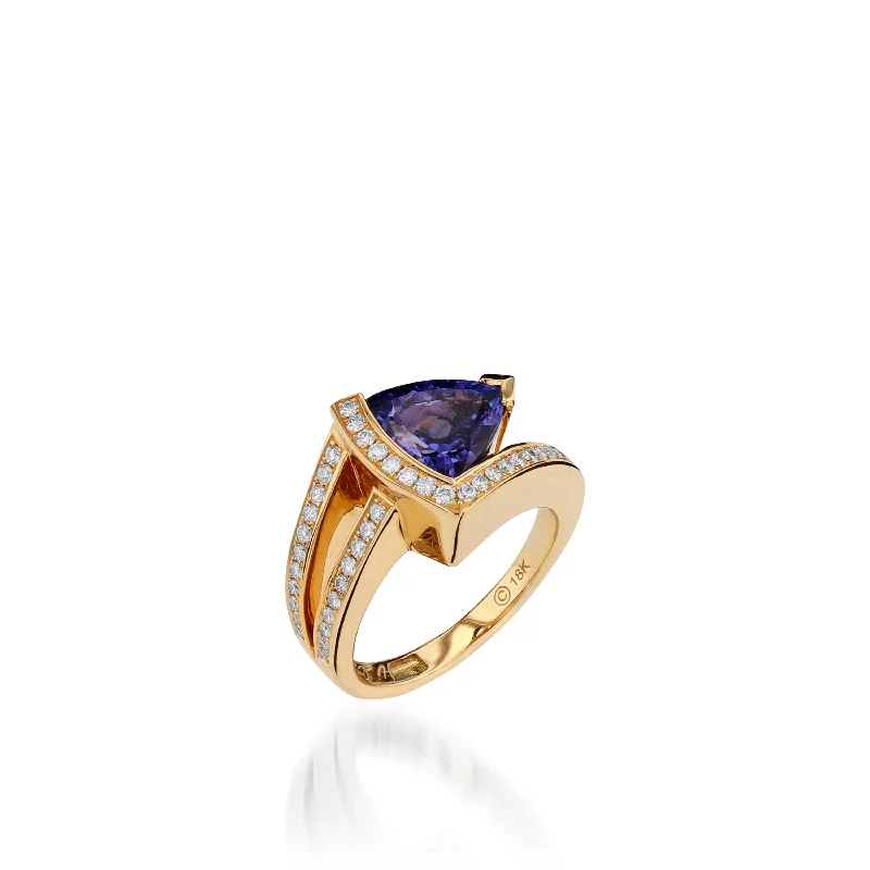 modern sleek stellar ring-Signature Trillion Tanzanite and Pave Diamond Ring