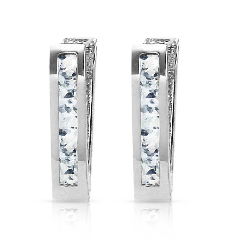 modern tiered topaz earrings-0.85 Carat 14K Solid White Gold Oval Huggie Earrings Aquamarine