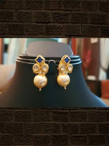 bold pentagonal topaz earrings-Blue stone and kundan flower with pearl drop