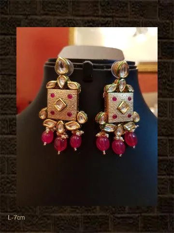 gothic-inspired bear claw earrings-Ivory finish square kundan earring with ruby drops