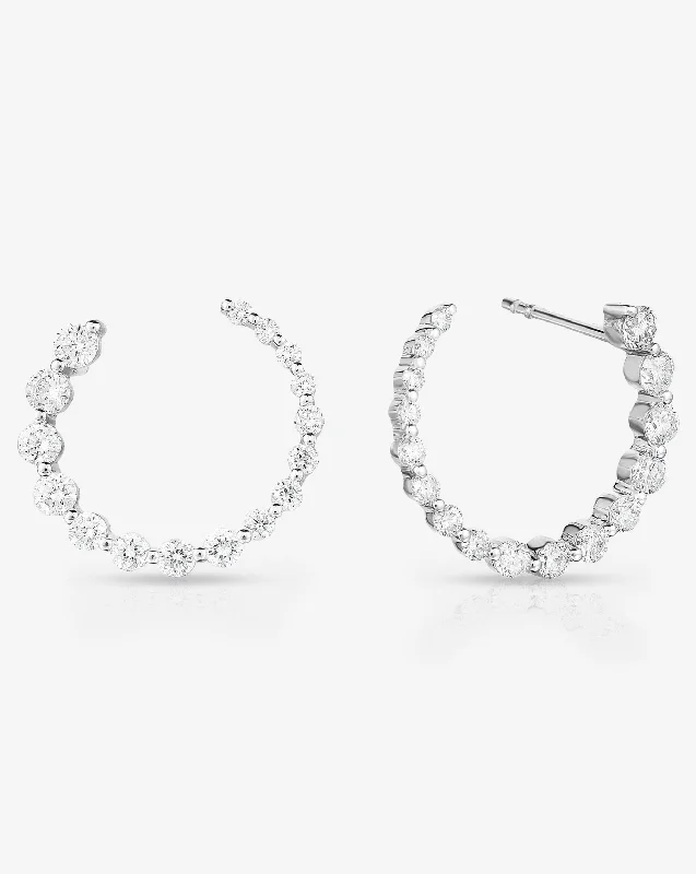 nature-themed willow earrings-Graduated Single Prong Diamond Circle Studs